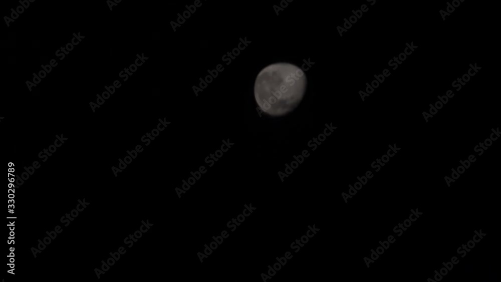The moon reflected on the water surface and its fluctuation The moon reflected on the water surface and its fluctuation
