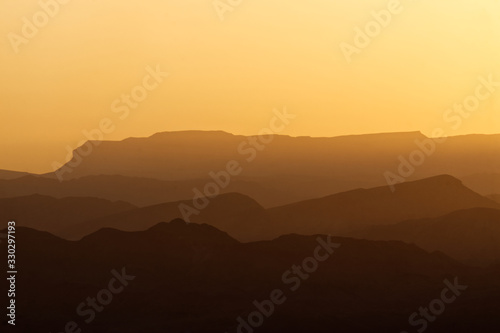 Landscape of Wadi Rum hills and desert in Jordan just before sunset in the Spring