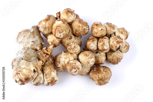 Jerusalem artichokes isolated on white