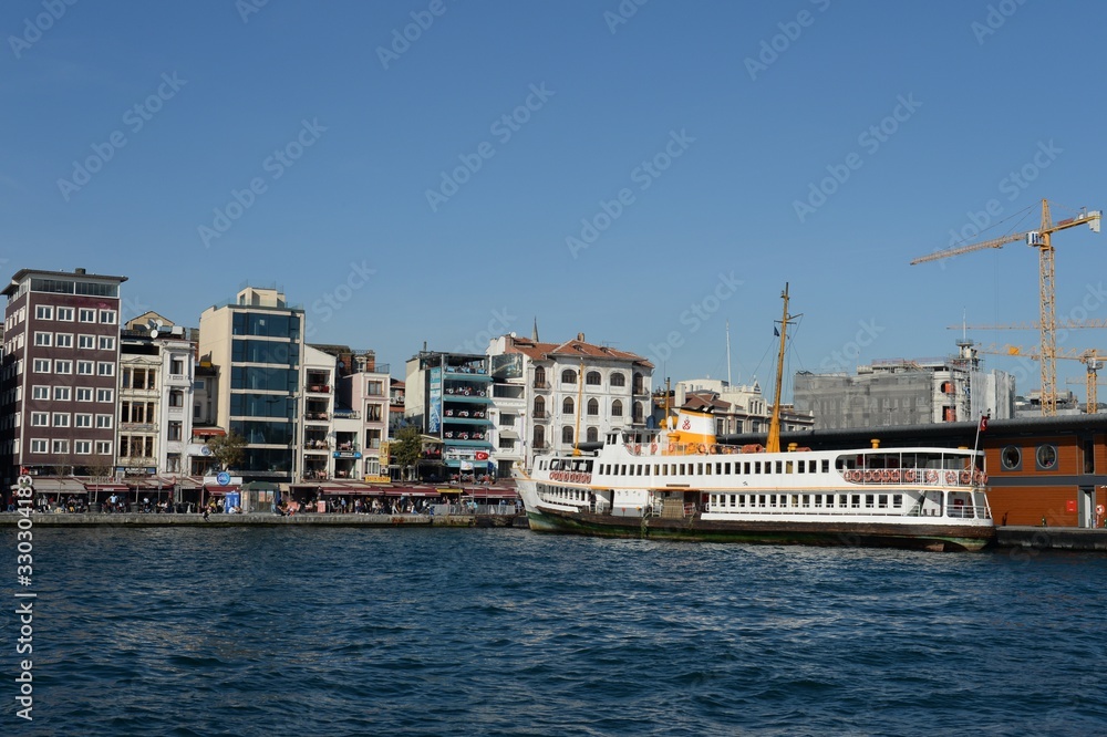 Pleasure boat at the pier of the Karakay city lines in the Bosphorus. Istanbul Pleasure boat at the pier of the Karakay city lines in the Bosphorus. Istanbul