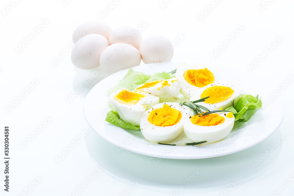 boiled eggs with salad leaves in a plate boiled eggs with salad leaves in a plate