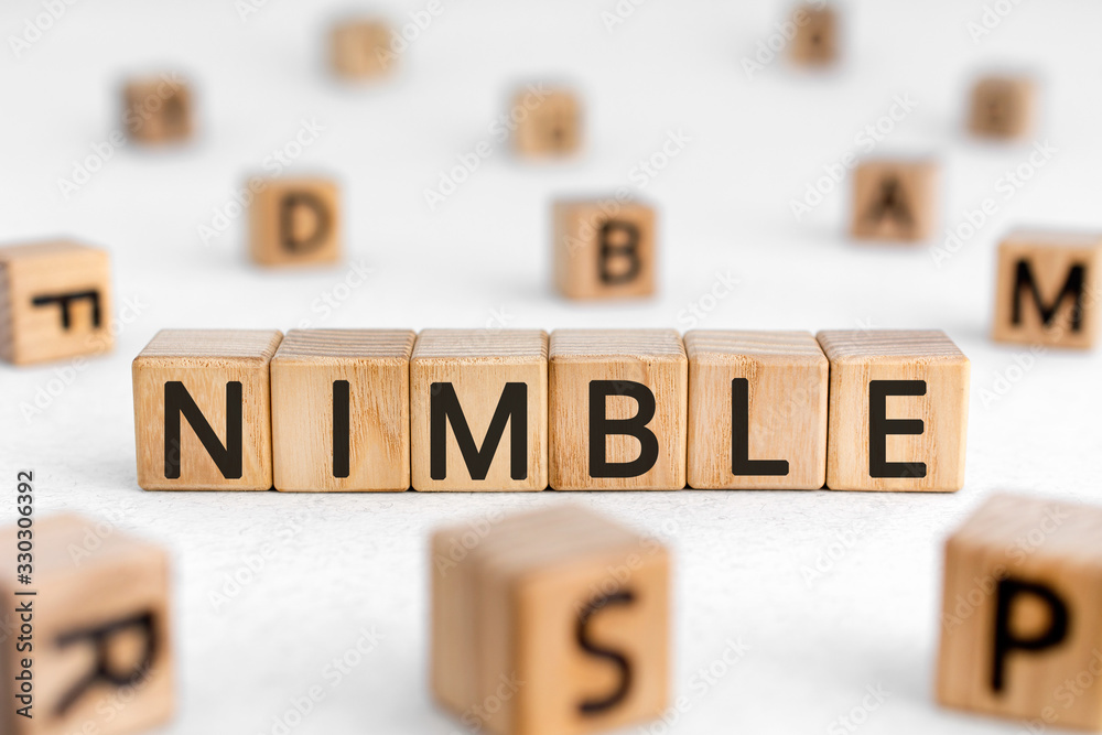 Ταπετσαρία Nimble - word from wooden blocks with letters, quick agile nimble concept, rando