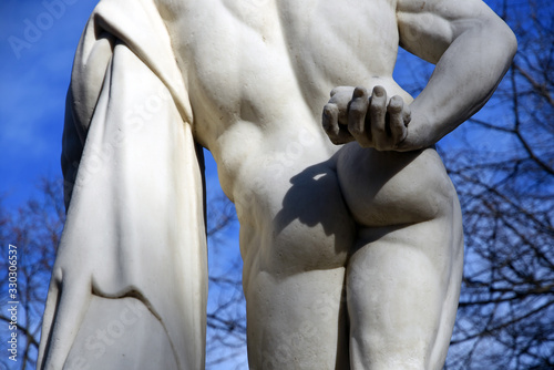 Sculpture of Hercules Farnese in Alexanders Garden in historic city center of Saint-Petersburg, Russia. Popular landmark. photo