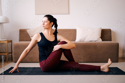 Photos Woman are doing seated twist exercises for health and a firmer body