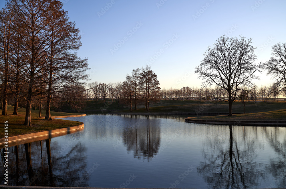 St. Louis Missouri lake park; reflection of trees in the water St. Louis Missouri lake park; reflection of trees in the water