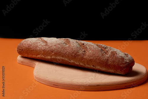 Sliced rye bread on a cutting board. Freshly Baked Bread