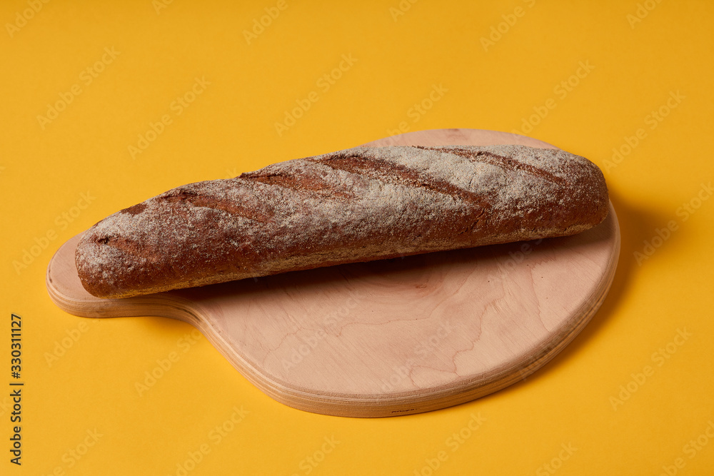 Sliced rye bread on a cutting board. Freshly Baked Bread Sliced rye bread on a cutting board. Freshly Baked Bread