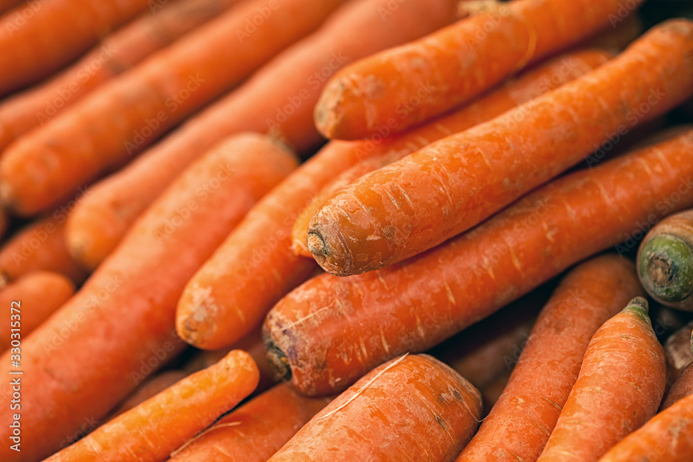 Carrots. Fresh organic carrots. Background texture of carrots. Carrots. Fresh organic carrots. Background texture of carrots.