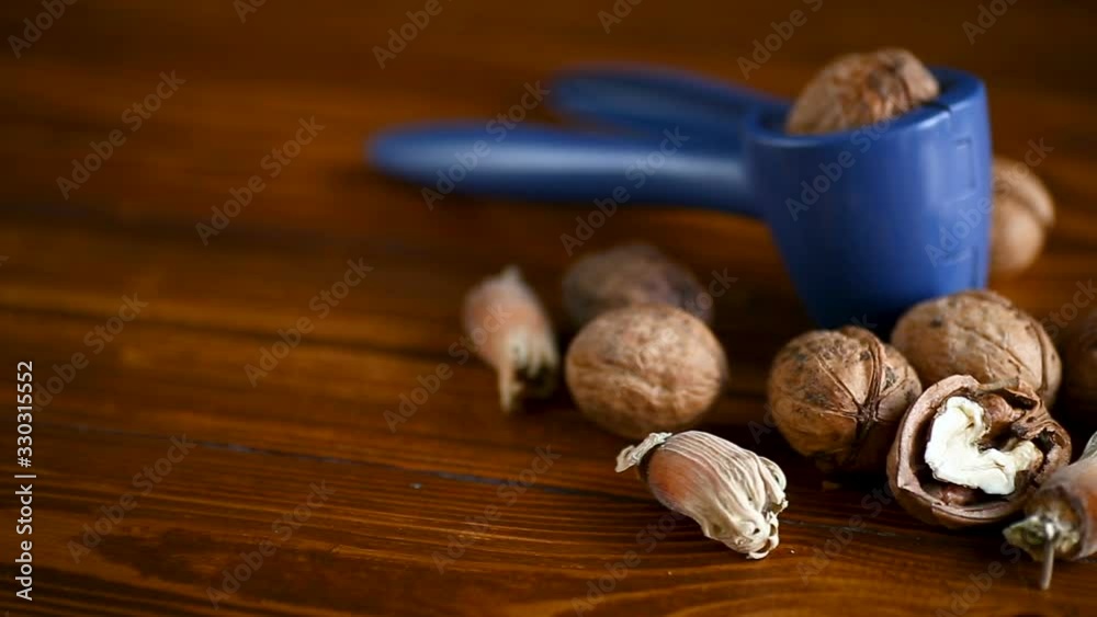 organic natural walnuts on a wooden table organic natural walnuts on a wooden table