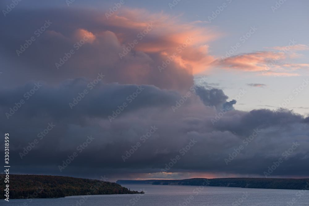 Autumn landscape at dawn of the shoreline of Lake Superior with passing storm, Pictured Rocks National Lakeshore, Michigan's Upper Peninsula, USA