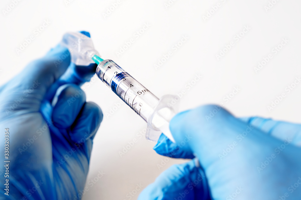 Syringes, water for injection, vials of vaccine. The concept of vaccination. Syringes, water for injection, vials of vaccine. The concept of vaccination.