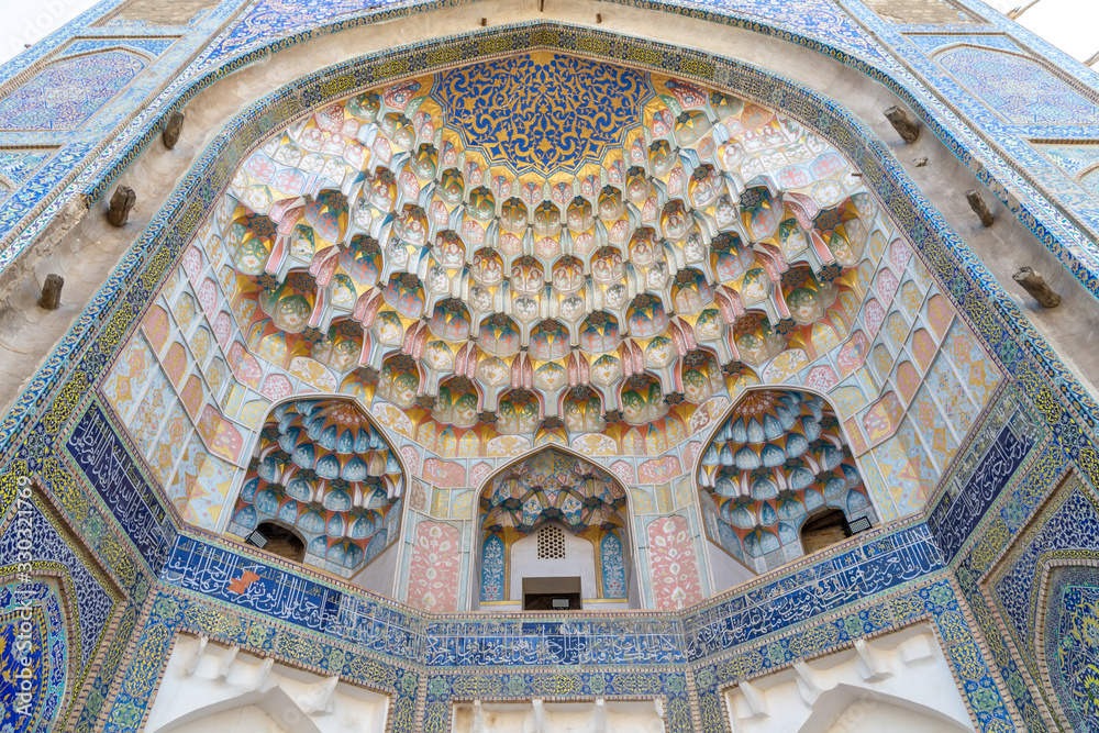 Ornament on the facade of the Madrasah of Abdulaziz Khan. Bukhara city, Uzbekistan