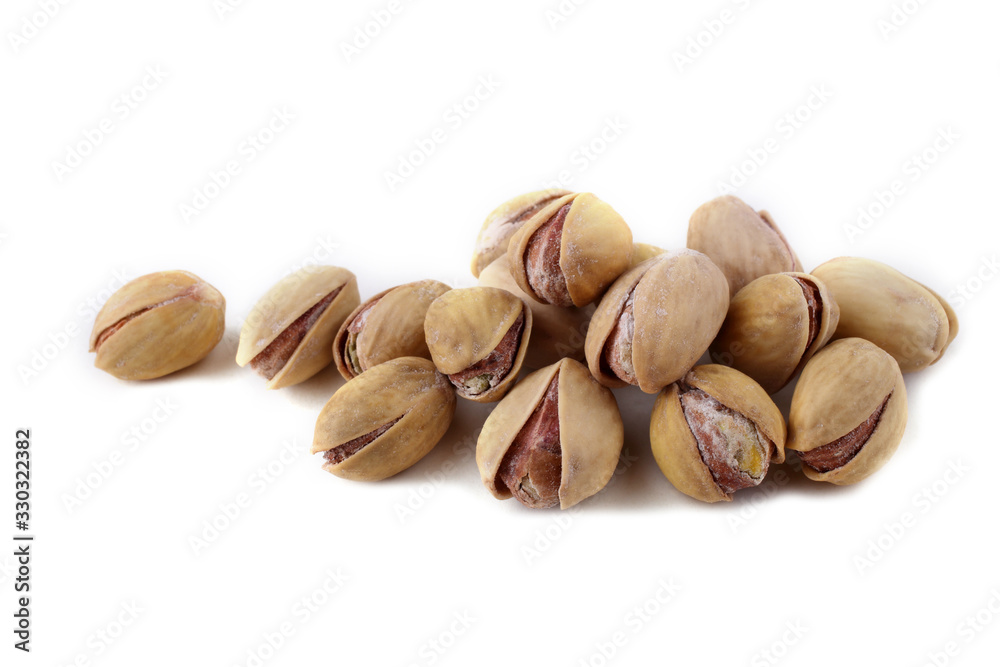 Pistachio nuts isolated on white Pistachio nuts isolated on white