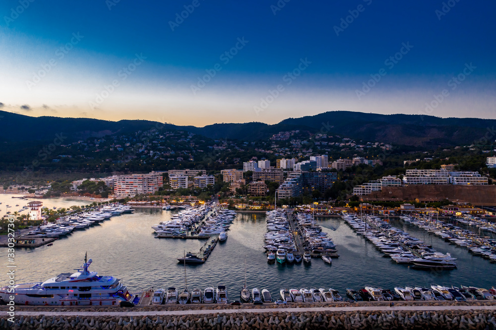 Aerial view, Puerto Portals luxury marina, Platja de s' Oratori beach and Illa d'en Sales, Portals Nous, Mallorca, Balearic Islands, Spain