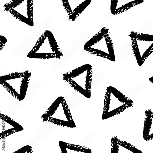 Seamless triangle pattern hand drawn with a brush. Vector Monochrome Grunge texture. Scandinavian background