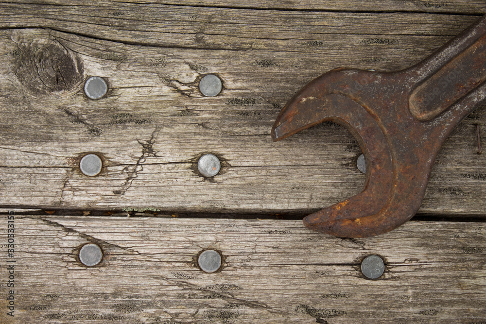 Old tools on wooden background Old tools on wooden background