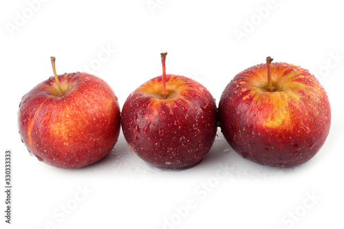 Three red little apples
