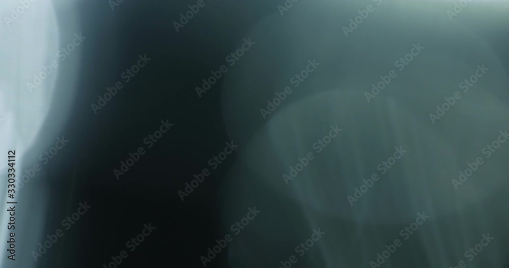 Slow motion real lens flare through glass effects for overlay or transition