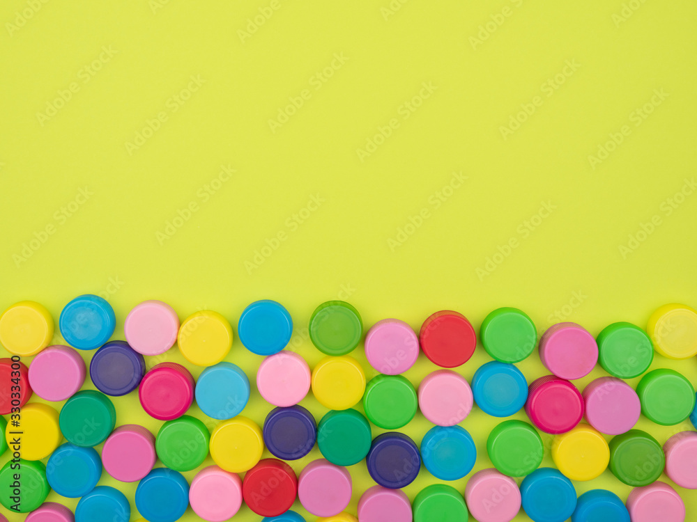 Colored plastic cover on the green background. Colored plastic cover on the green background.