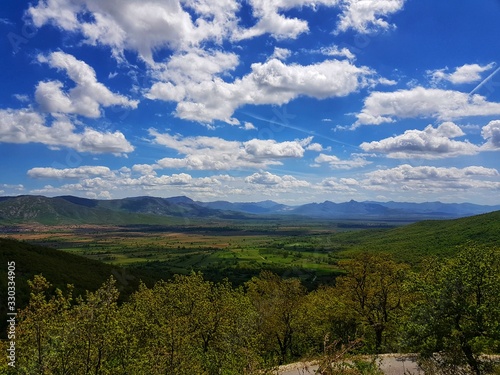 landscape with mountains and clouds green