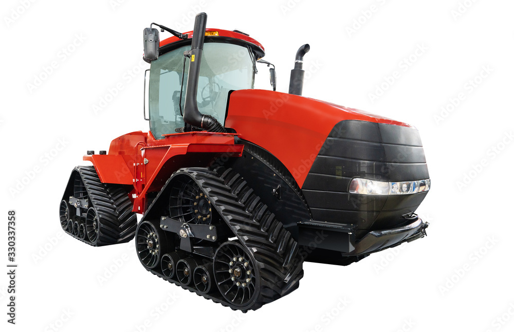 Red rubber tracked agricultural tractor isolated on white