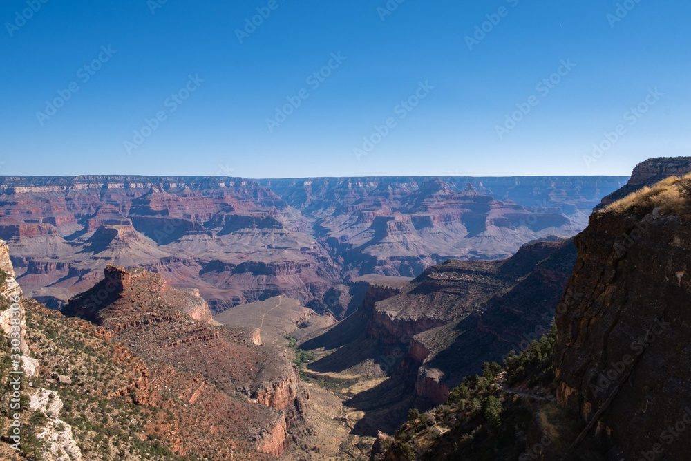 view on the grand canyon and red cliffs