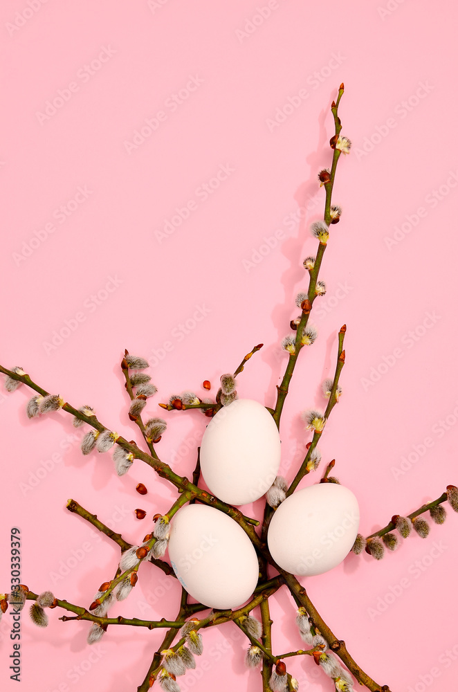 White eggs with green myrtle leaves pattern on vibrant pastel color background. Spring and Easter holiday concept with copy space.