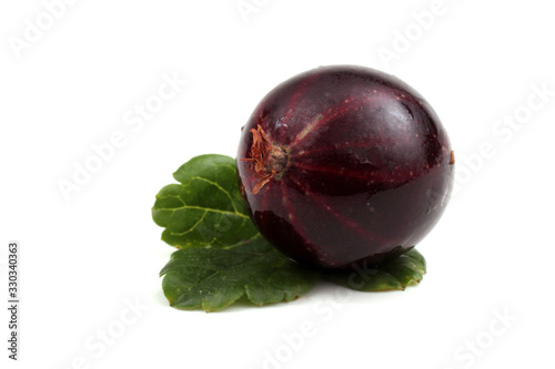 Black-violet gooseberry on leaf