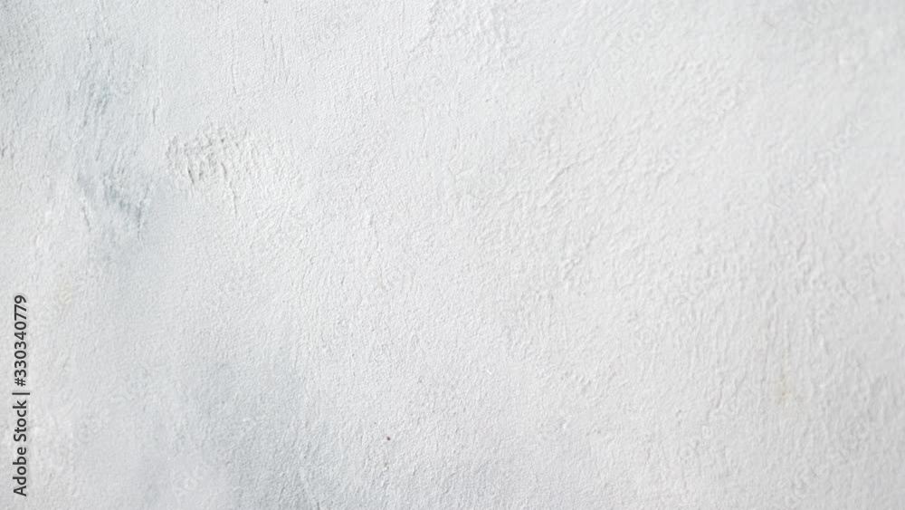 White concrete wall texture background, cement wall, plaster texture, for designers. 4k video motion 3840x2160 White concrete wall texture background, cement wall, plaster texture, for designers. 4k video motion 3840x2160