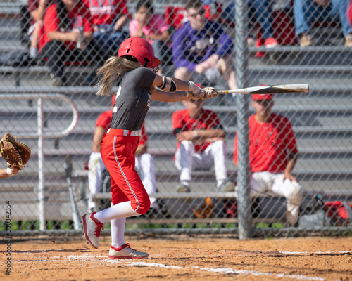 Girl Fastpitch Softball player in action during a competitive game