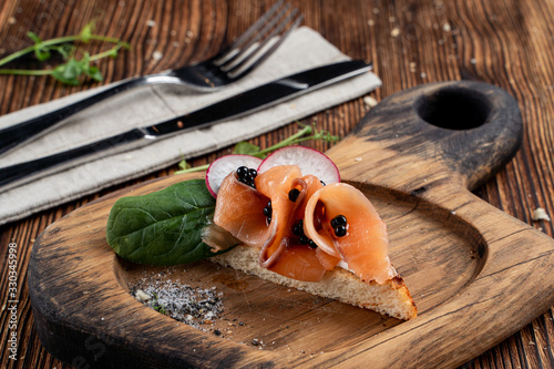 Salted salmon bruschetta with cream cheese in toasted bread