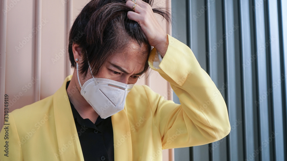 Asian woman wearing mask tired angry and upset with situation Covid-19 outbreak and world pollution Asian woman wearing mask tired angry and upset with situation Covid-19 outbreak and world pollution