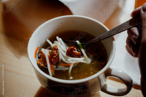 warm mushroom noodle soup in a cup