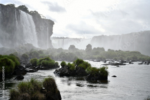 raging waterfall and mountain river in the jungle