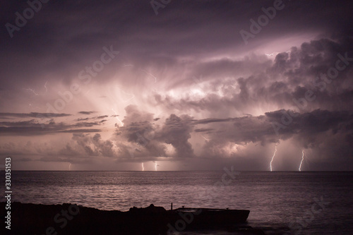 Lightning storm in the night sky over the mediterranean sea in San Antoni, Ibiza 
