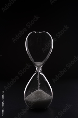 hourglass on a black background