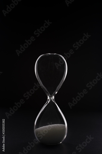hourglass on a black background