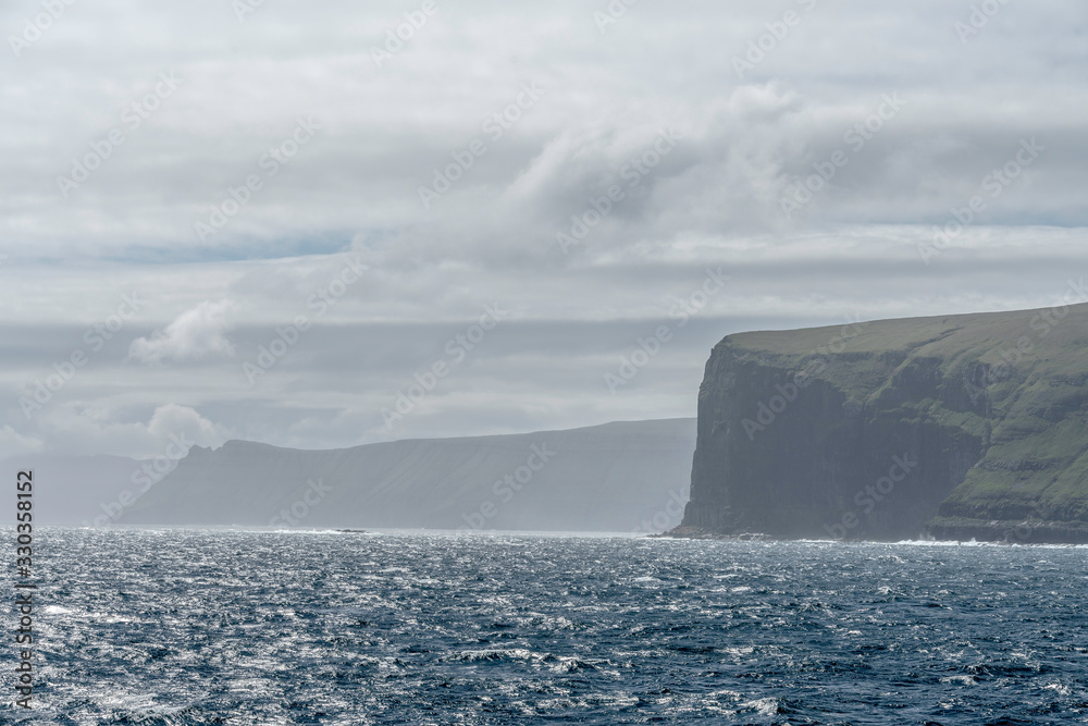 Cliffs of Sandoy island in the Faroe Islands