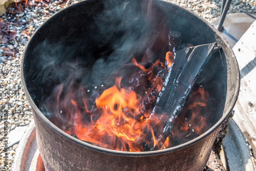 Burning barrel in the middle of the garden Burning barrel in the middle of the garden