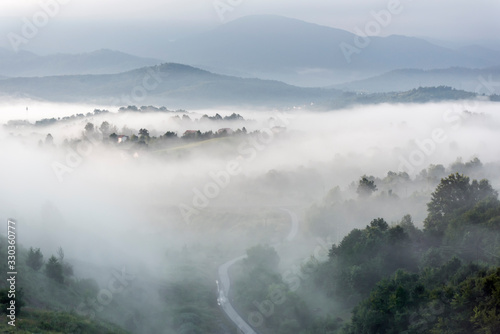 morning foggy landscape in the month of June