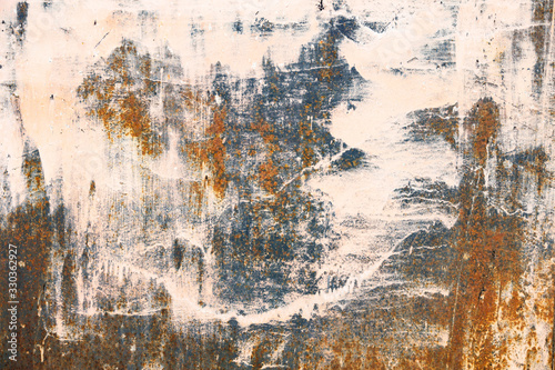 Texture of a grunge dirty wall close up, colorful cracked plaster background