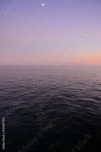 SANTA CRUZ, CALIFORNIA, USA - OCTOBER 7, 2019: Ocean view from Santa Cruz Wharf at sunset