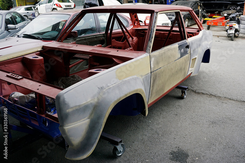 Classic italian rally car in a repair shop