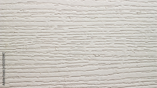 Background of beige plaster with irregularities, closeup