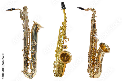 classical wind musical instrument saxophone, set of three saxophones isolated on a white background