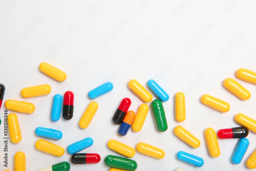 pills on a light background top view. Medicine, treatment, illness. Medication in tablets. pills on a light background top view. Medicine, treatment, illness. Medication in tablets.