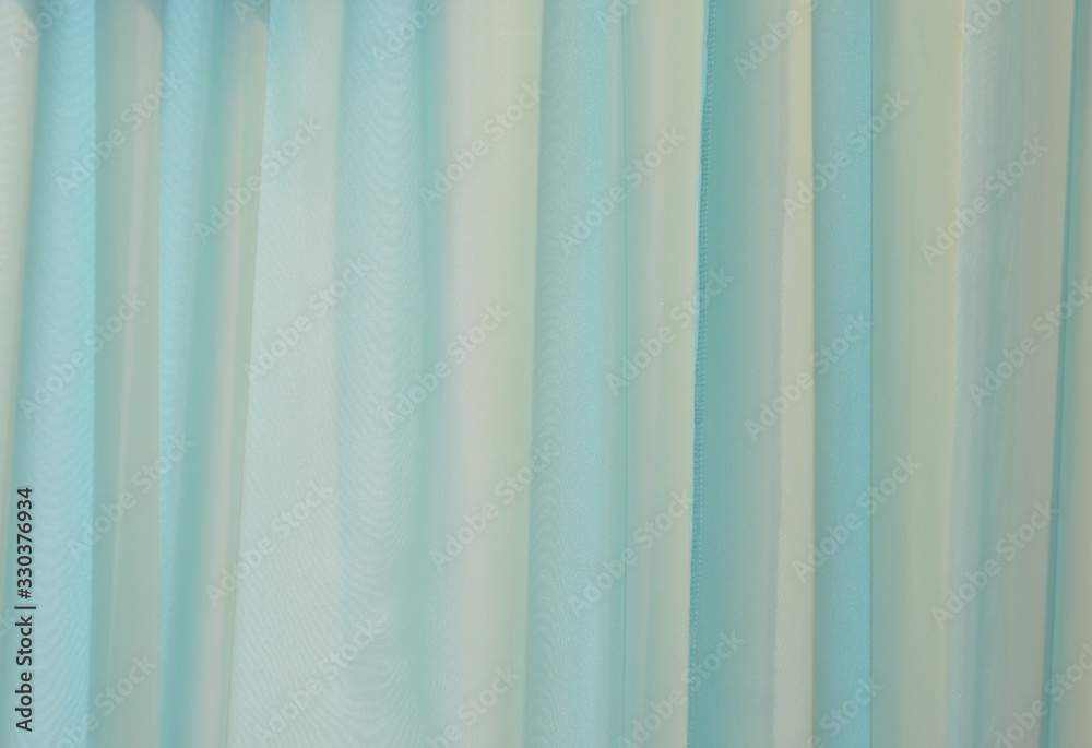 Obraz premium Light blue textile background for copy space