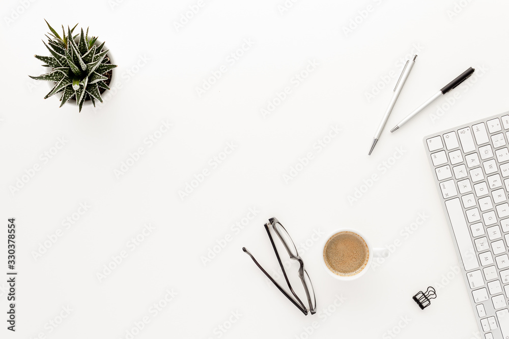 Pen plant coffee cub glasses modern business background with copy space for your text. Top view, flat lay.