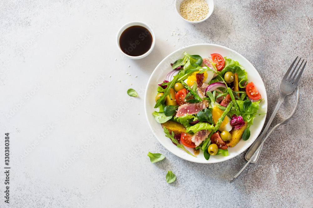 Fresh vegetables, tuna, eggs and baked potatoes salad Fresh vegetables, tuna, eggs and baked potatoes salad