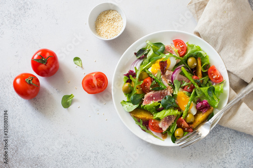 Fresh vegetables, tuna, eggs and baked potatoes salad